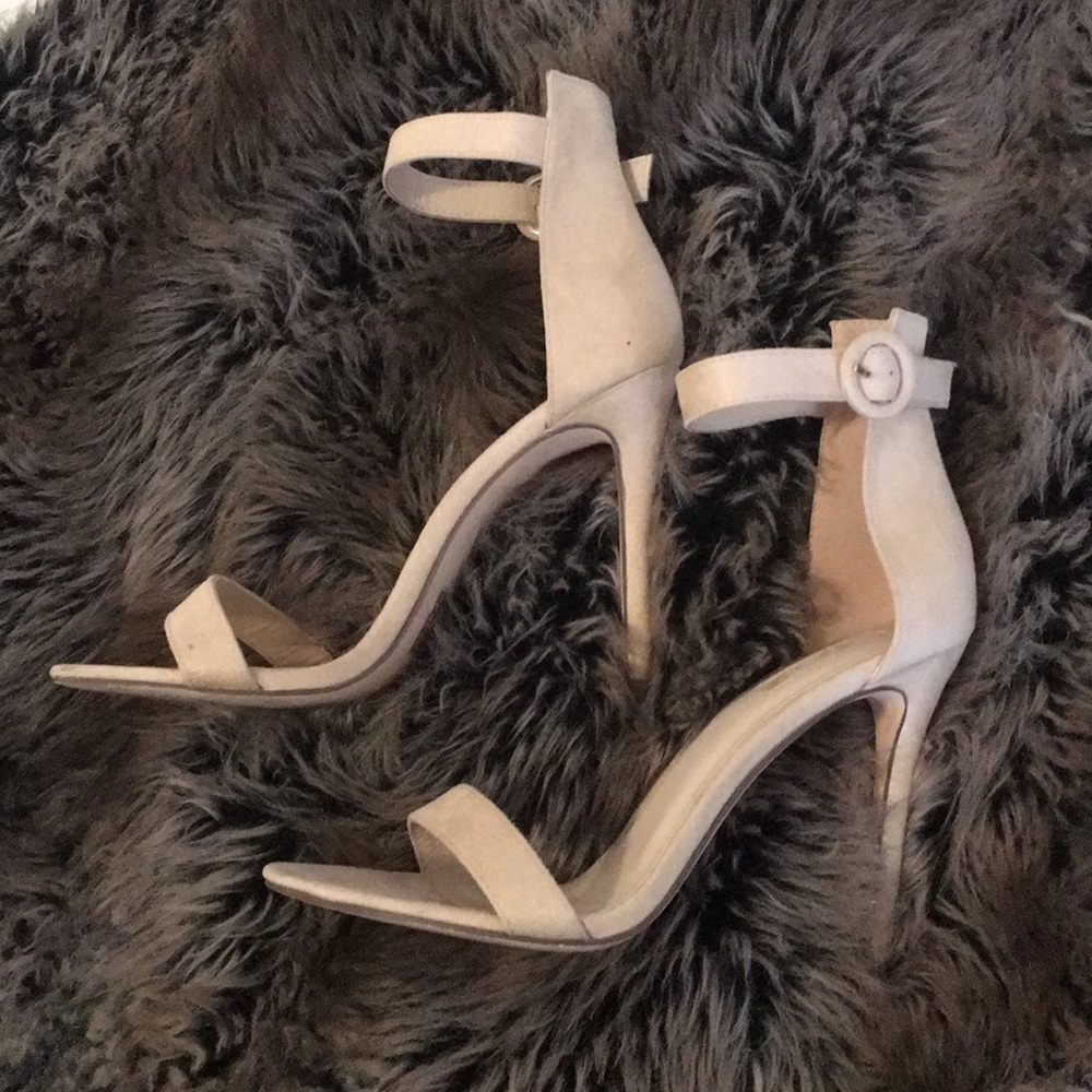 Light cream suede strappy heels with buckle.